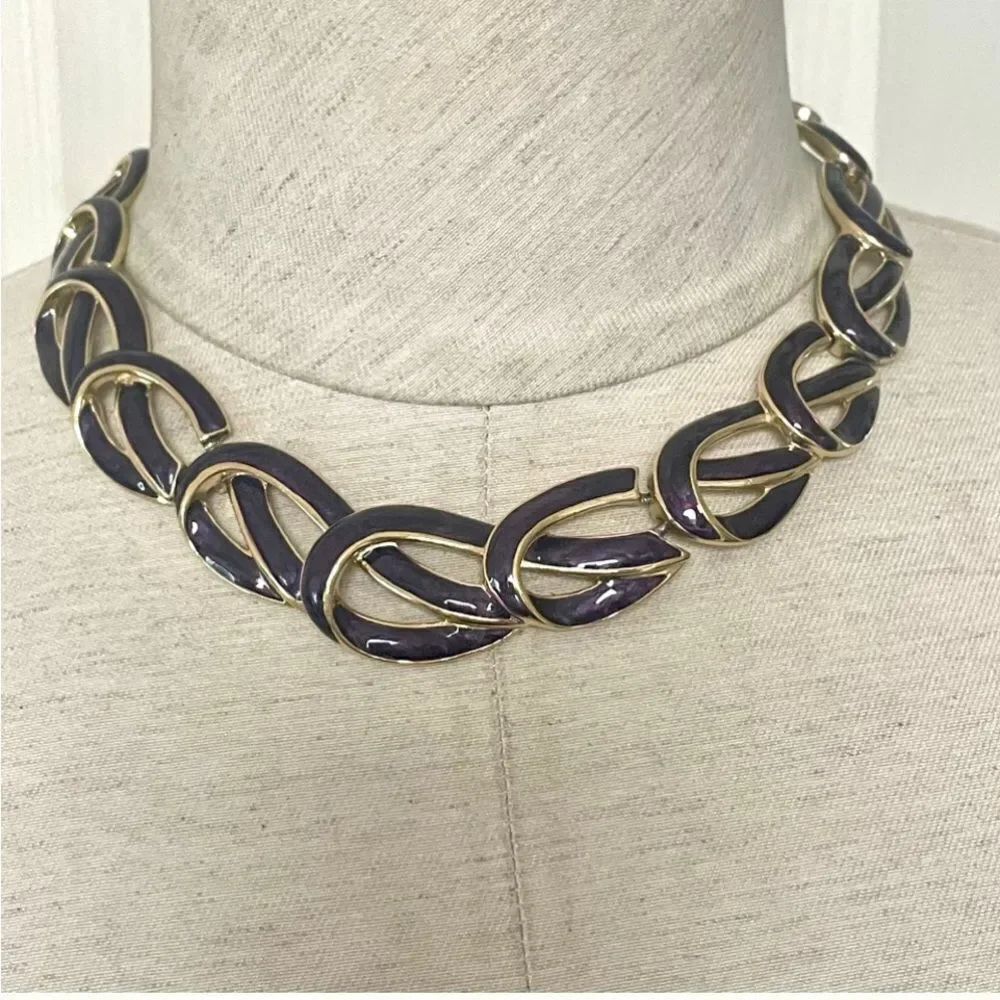 Vintage Trifari gold tone and purple knot necklace